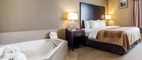 Suite, 1 King Bed, Non Smoking, Jetted Tub | Premium bedding, pillowtop beds, desk, blackout drapes