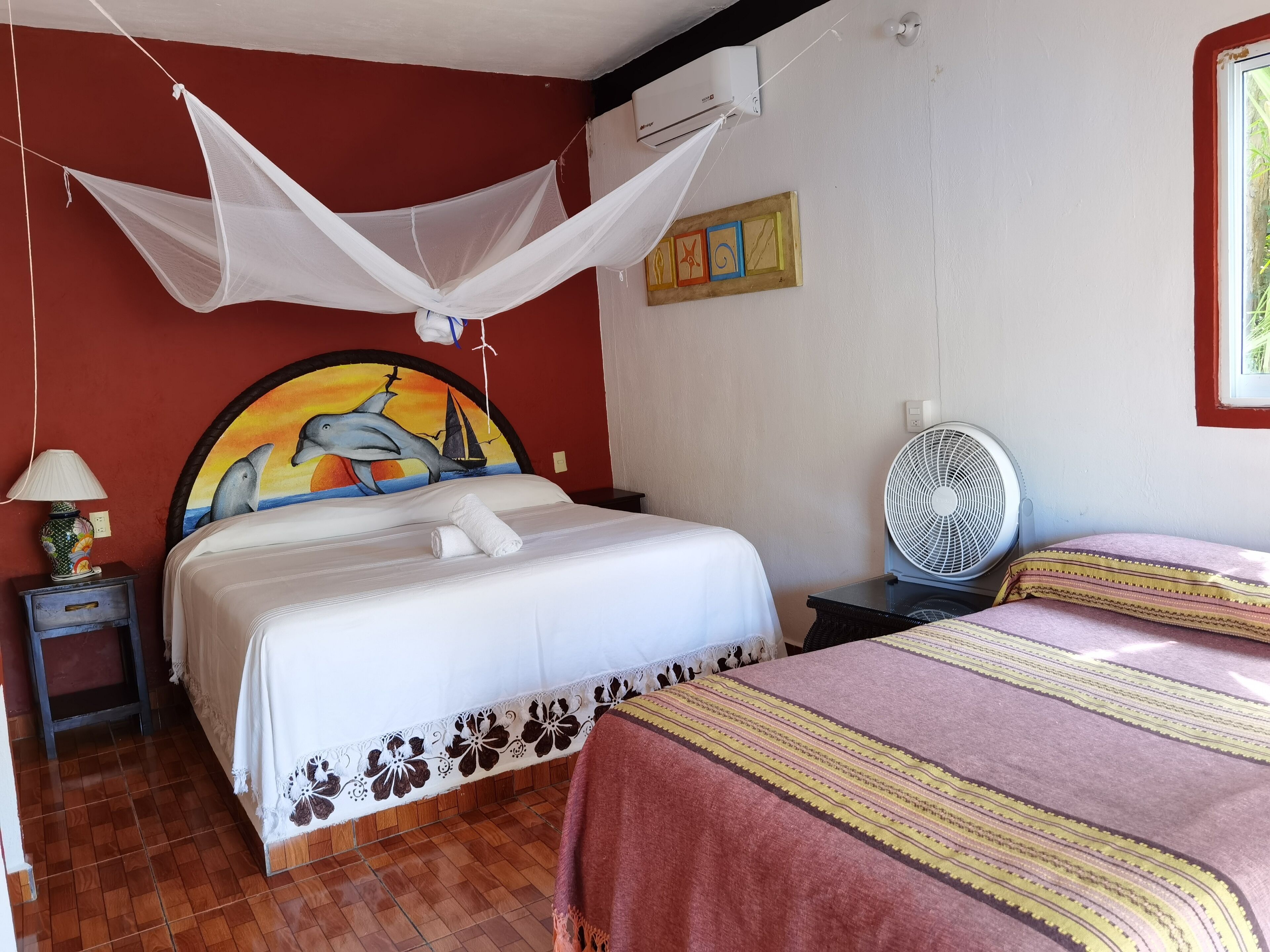 room, multiple beds, sea view | 1 bedroom, iron/ironing board, free wifi, bed sheets