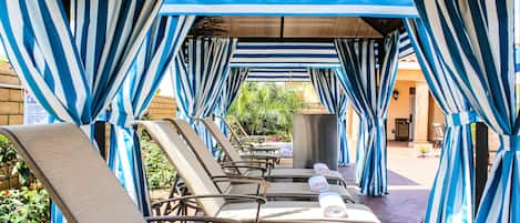 Outdoor pool, pool cabanas (surcharge), pool umbrellas