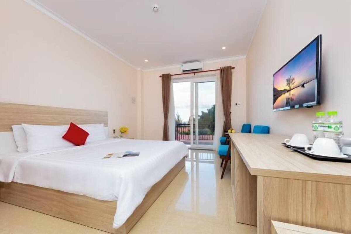 Luxe beddengoed, een minibar, een kluis op de kamer, een bureau