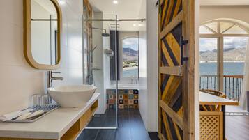Shower, free toiletries, hair dryer, slippers