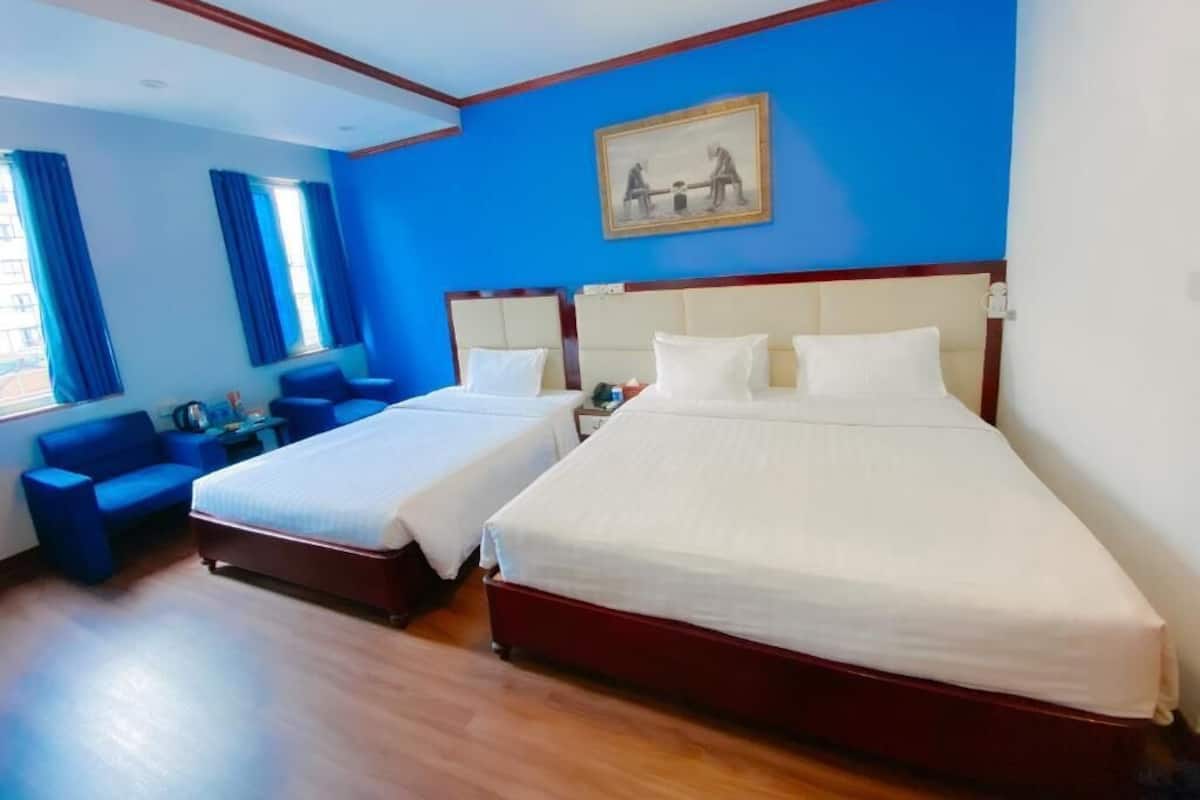Chambre Familiale | Minibar, coffres-forts dans les chambres, rideaux occultants
