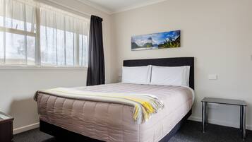 Suite Deluxe, 1 habitación | 1 dormitorio y ropa de cama de alta calidad