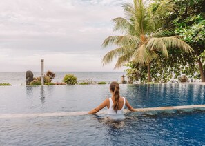 2 outdoor pools, pool umbrellas, pool loungers