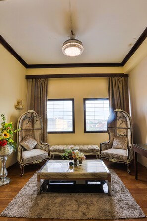 Deluxe Suite, City View | Minibar, in-room safe, desk, blackout drapes - Hotel Essencia (Dumaguete)