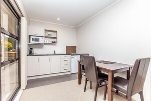 Executive Room, 1 Bedroom | Blackout drapes, soundproofing, iron/ironing board, free WiFi