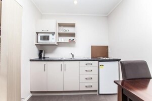 Mini-fridge, microwave, stovetop, electric kettle