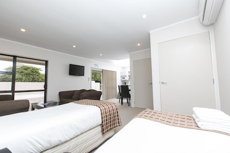 1 bedroom, blackout drapes, soundproofing, iron/ironing board