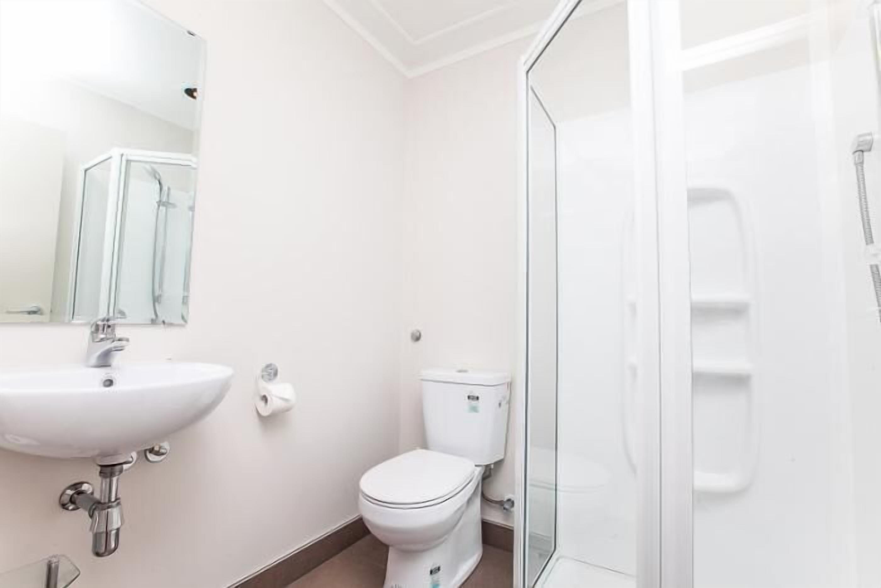 studio | bathroom | shower, hair dryer, towels, soap