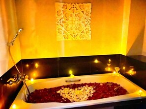 Shower, free toiletries, slippers, towels