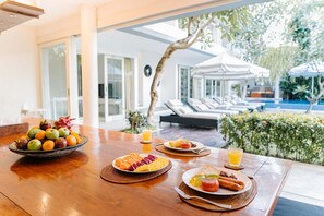 Daily continental breakfast for a fee - CassaMia Bali (Jimbaran)
