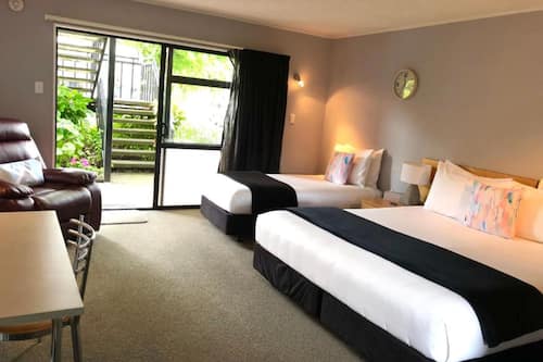 Family Studio, 1 Bedroom, Non Smoking, Kitchenette (1 King & 1 Single bed) | Premium bedding, laptop workspace, blackout drapes, iron/ironing board