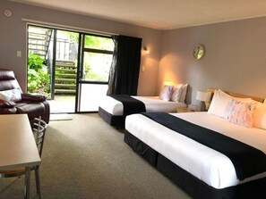 Family Studio, 1 Bedroom, Non Smoking, Kitchenette (1 King & 1 Single bed) | Premium bedding, laptop workspace, blackout drapes, iron/ironing board