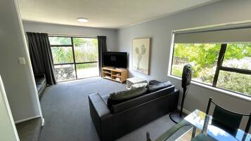 Deluxe Apartment, Non Smoking, Kitchen (3 bedroom apartments) | Living area