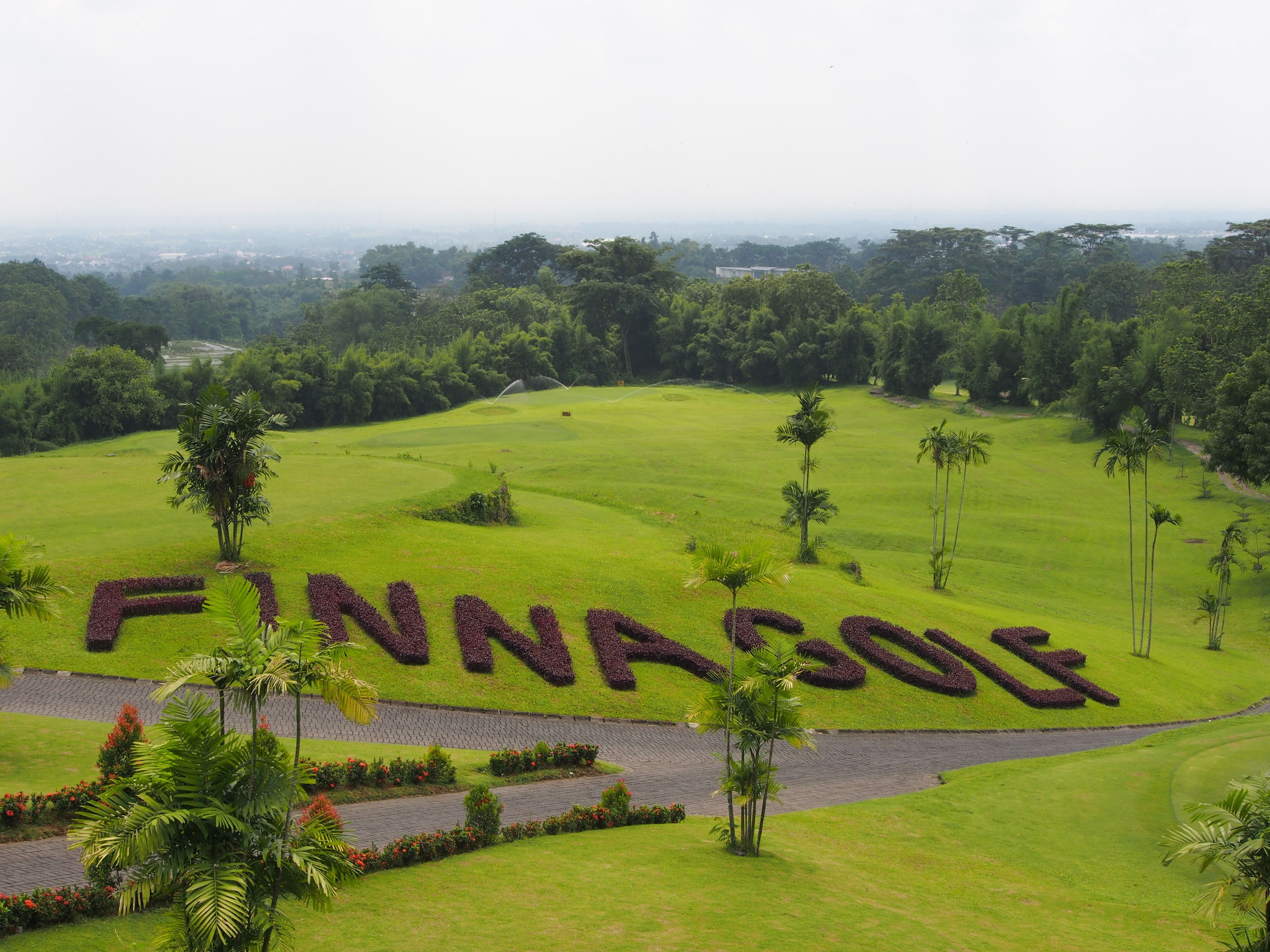 A golf course with the word "FINNAGOL" spelled out in the grass.