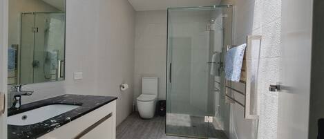 Shower, eco-friendly toiletries, hair dryer, soap