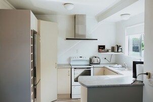 Family House | Private kitchen | Fridge, microwave, stovetop, electric kettle