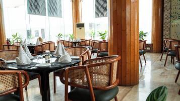 Breakfast, lunch, dinner served; local and international cuisine