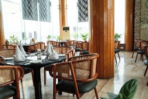 Breakfast, lunch, dinner served; local and international cuisine 