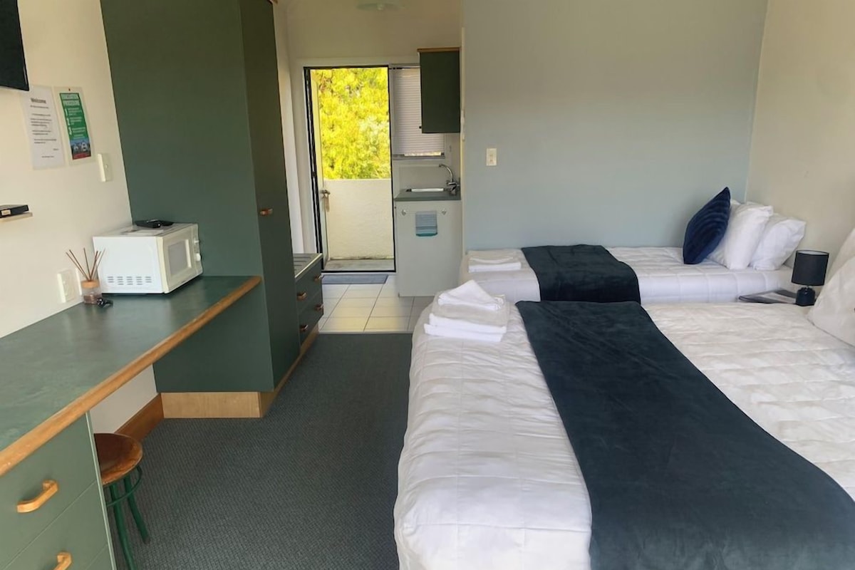 Desk, blackout drapes, iron/ironing board, cribs (surcharge)