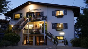 A two-story building with a sign reading "Trolldhagenen Lodge". - Troldhaugen Lodge - Adults Only (Jindabyne)