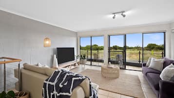 Beachfront Apartment 1, 2 Bedrooms, Kitchen, Bathroom Non Smoking | Living area | TV, DVD player