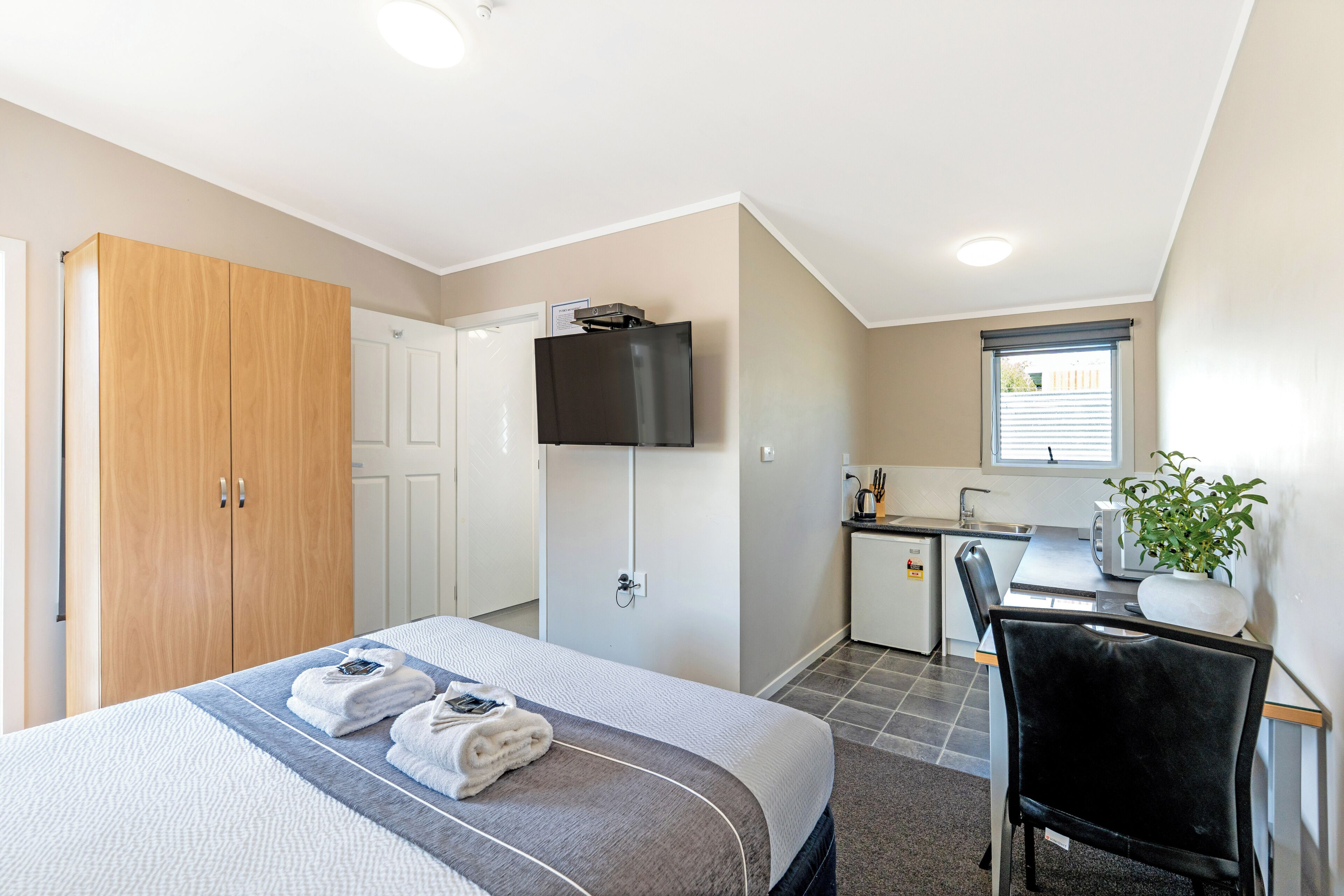 Egyptian cotton sheets, premium bedding, desk, laptop workspace