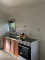 Unit 14: Two bedroom cottage | Private kitchen | Fridge, microwave, stovetop, toaster