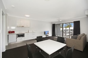 Family Suite, 1 Bedroom, Non Smoking, Balcony | Living area | Flat-screen TV