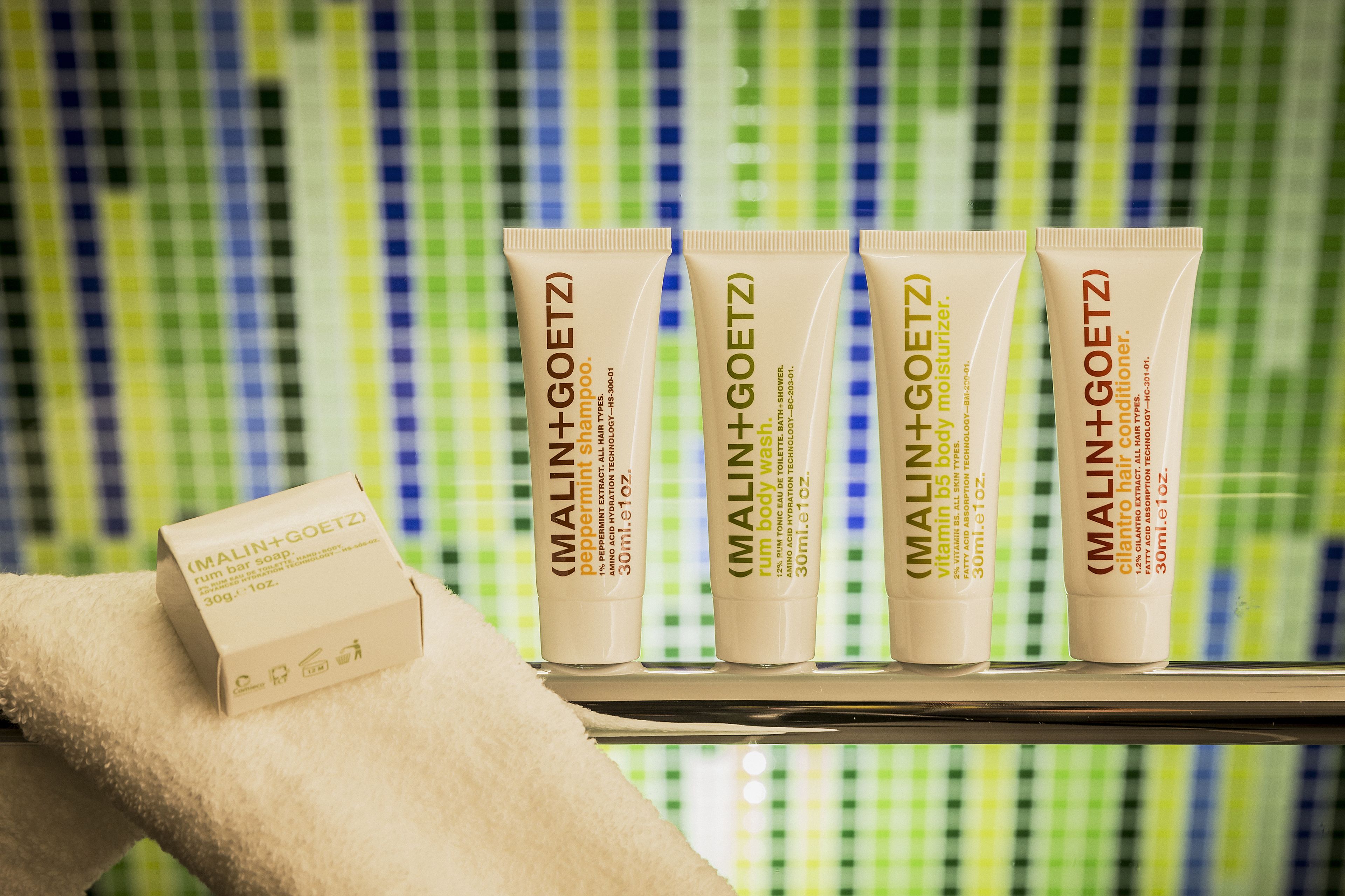 shower, rainfall showerhead, designer toiletries, hair dryer