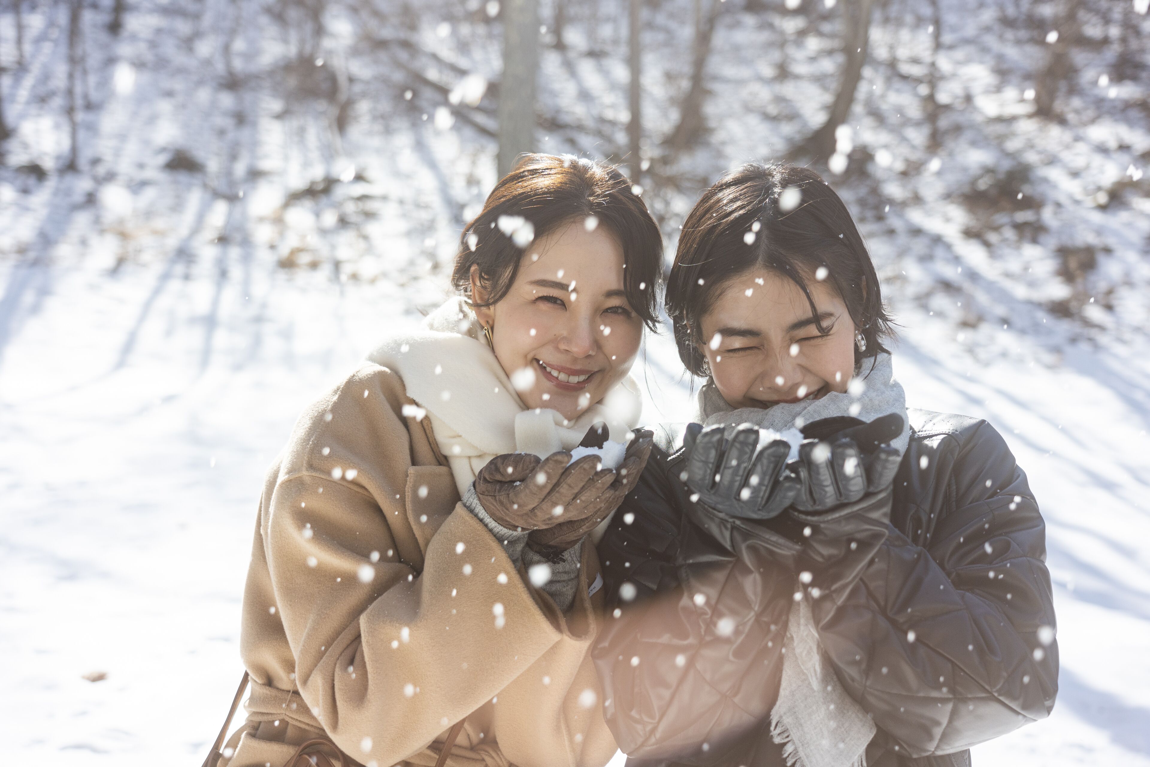 Two people in a snowy outdoor setting.