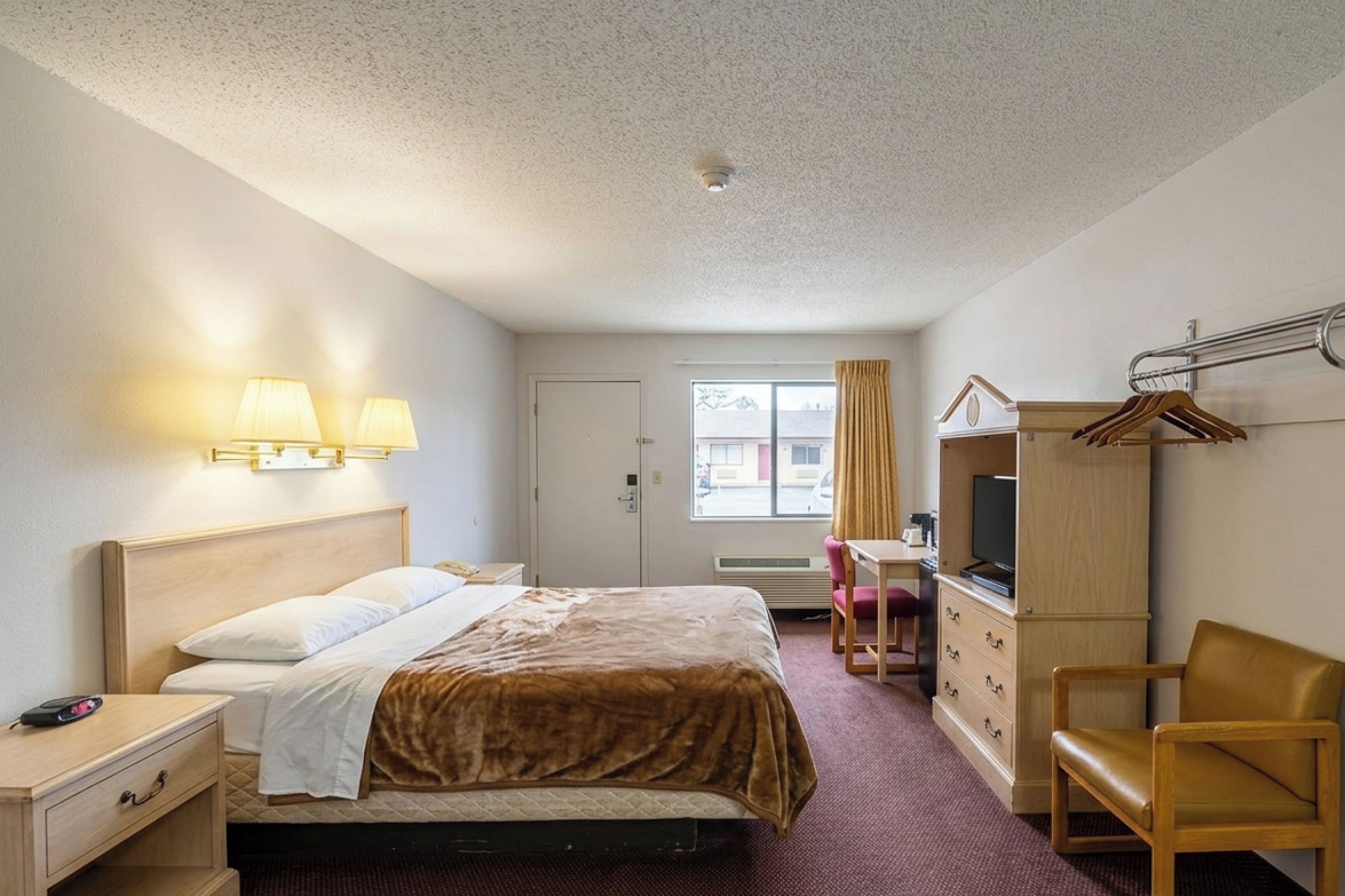 Quarto solteiro, para não fumantes | 1 quarto, frigobar, escrivaninha, ferros/tábuas de passar roupa