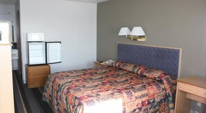 1 chambre, minibar, bureau, fer et planche à repasser