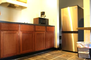 Suíte | Cozinha privada | Geladeira, micro-ondas (mediante solicitação)