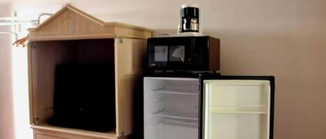 1 chambre, minibar, bureau, fer et planche à repasser