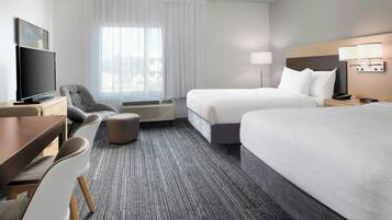 Pillow-top beds, in-room safe, laptop workspace, blackout curtains