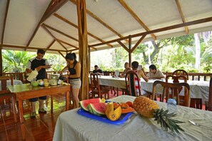 Breakfast, lunch, dinner served; local cuisine, garden views  - Poor Man's Paradise (Drake Bay)