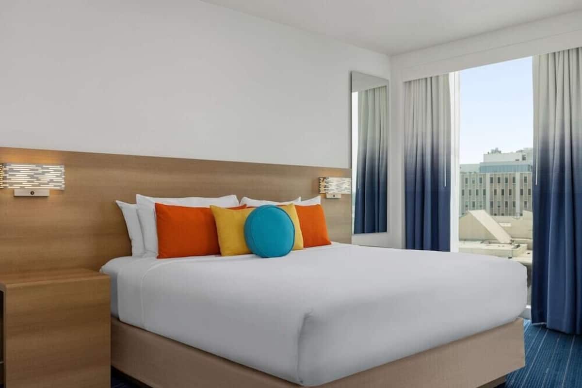 Premium bedding, down comforters, in-room safe, desk
