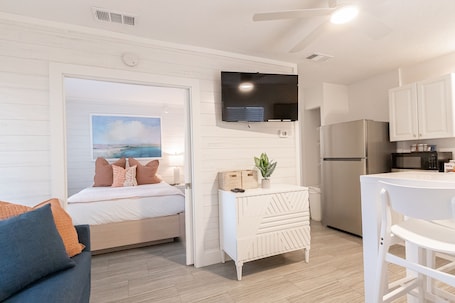 Luxury Suite, 1 Bedroom, Pool Access | Living area | Flat-screen TV. Siesta Key Beachside Villas