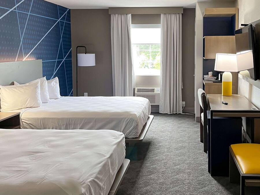 Desk, laptop workspace, blackout curtains, iron/ironing board