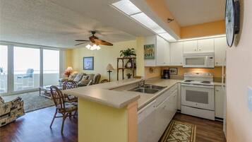 Premier Condo, 1 Bedroom | Private kitchen | Fridge, microwave, coffee/tea maker