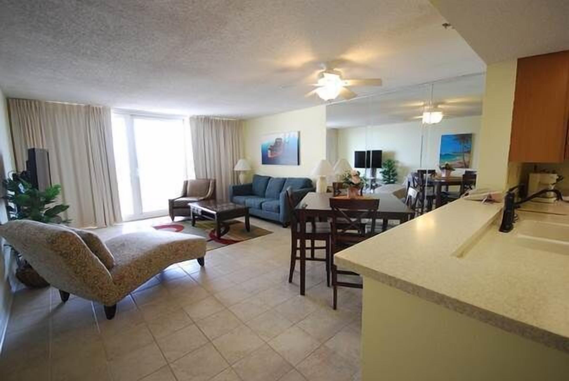 Premier Condo, 1 Bedroom | Living area | Flat-screen TV