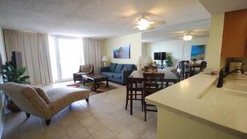 Premier Condo, 1 Bedroom | Living area | Flat-screen TV