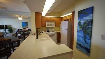 Premier Condo, 1 Bedroom | Private kitchen | Fridge, microwave, coffee/tea maker
