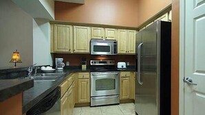 Standard Condo, 3 Bedrooms | Private kitchen | Coffee/tea maker, full-size fridge, microwave, cookware/dishes/utensils - Villagio by Perdido Key Resort Mgmt (Pensacola)