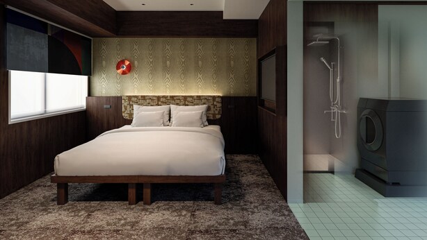 Une chambre moderne avec un grand lit, une douche intégrée et un téléviseur fixé au mur.