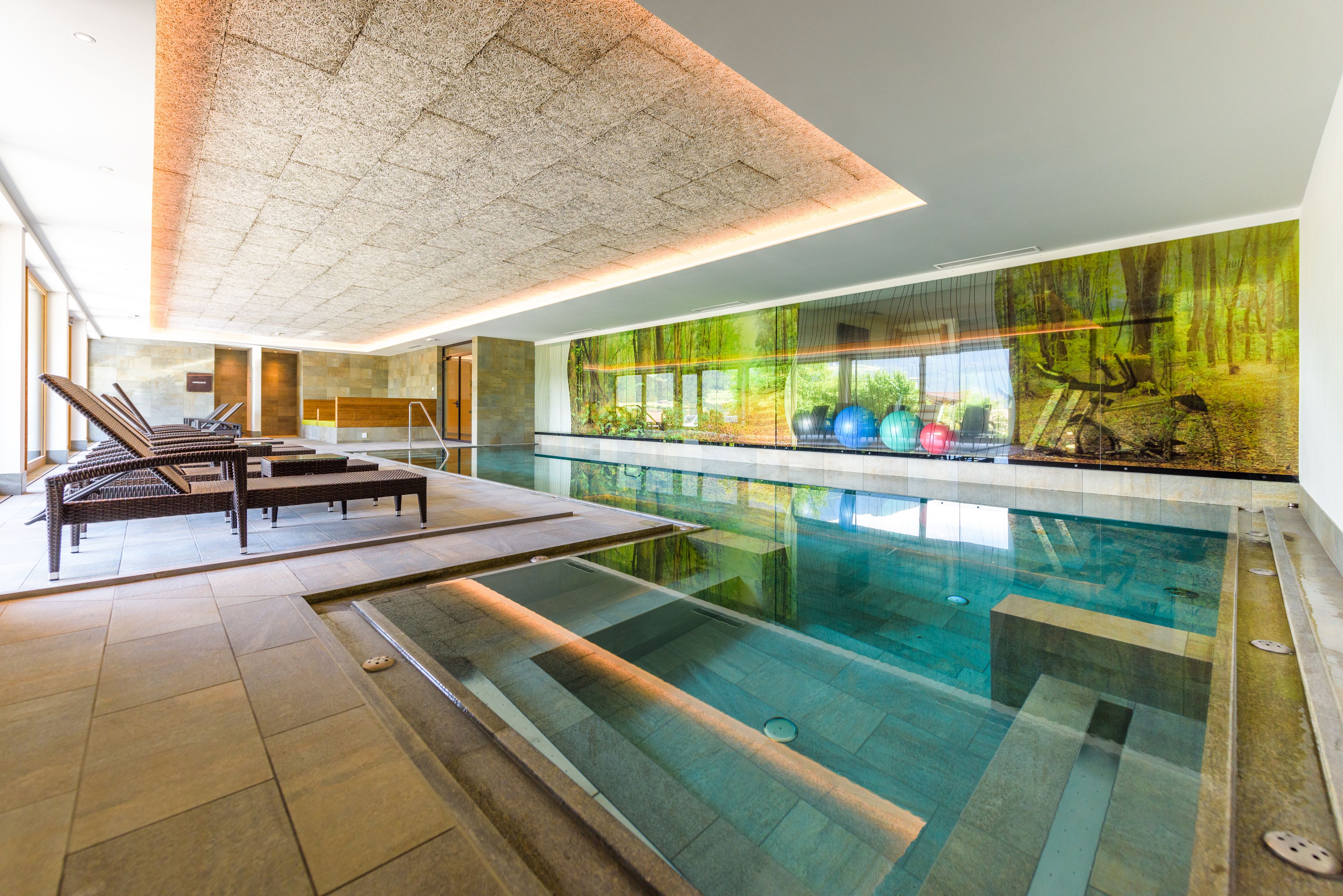 indoor pool, seasonal outdoor pool, pool umbrellas, pool loungers