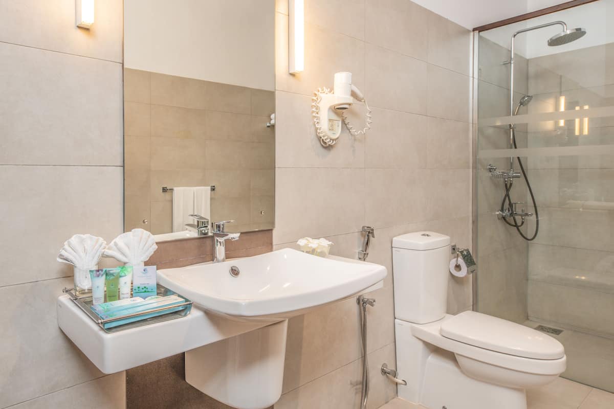 sea view room  | bathroom | shower, rainfall showerhead, free toiletries, hair dryer