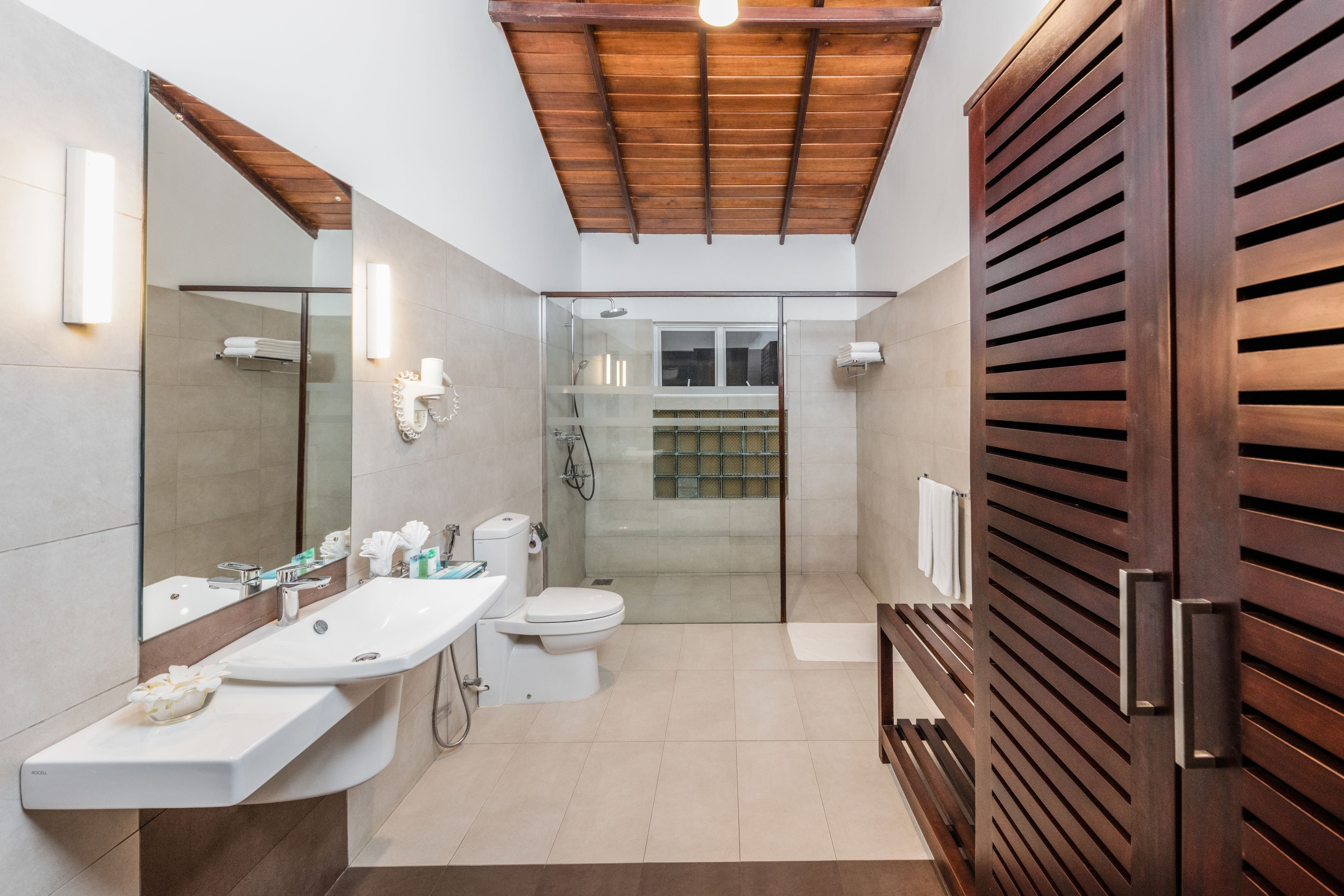 sea view room  | bathroom | shower, rainfall showerhead, free toiletries, hair dryer