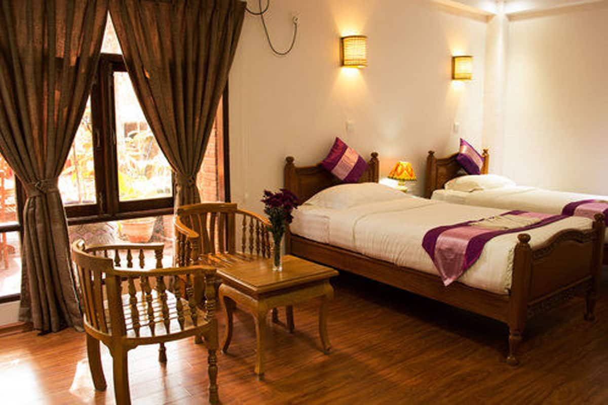 deluxe double or twin room, 1 double or 2 single beds, pool view | view from room